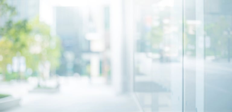 Blurred abstract glass wall from building background