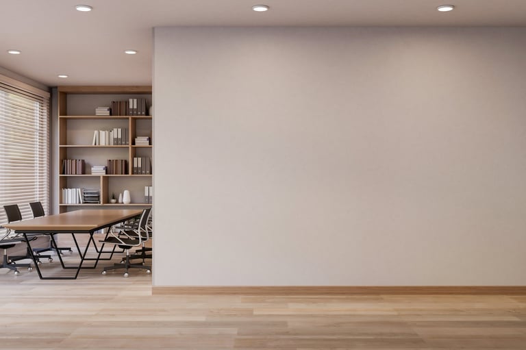 White wall and corridor aside meeting room with table and chairs on wooden parquet floor