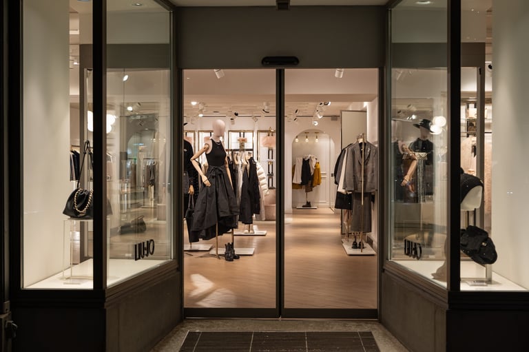 Liu Jo store front window with female mannequins dressed in stylish outfits
